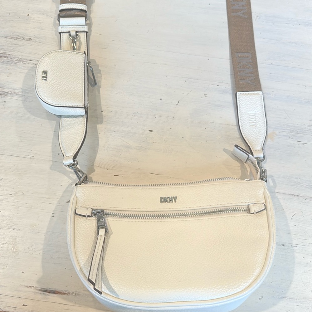 White DKNY crossbody bag.